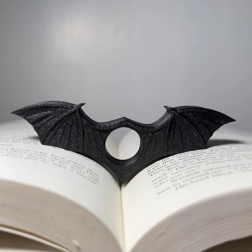 Bat Wing Thumb Page Holder